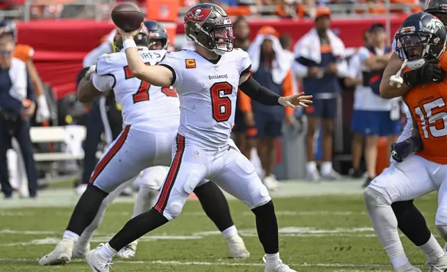 Tampa Bay Buccaneers quarterback Baker Mayfield (6) throws a pass against the Denver Broncos during the second half of an NFL football game, in Tampa, Fla. on Sunday, Sept. 22, 2024. (AP Photo/Jason Behnken)