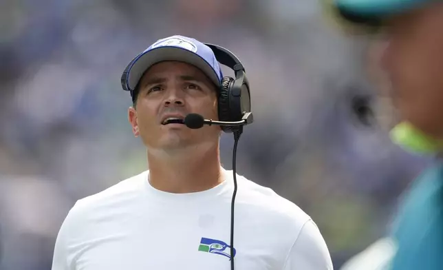 Seattle Seahawks head coach Mike Macdonald reacts during the first half of an NFL football game against the Denver Broncos, Sunday, Sept. 8, 2024, in Seattle. (AP Photo/Lindsey Wasson)