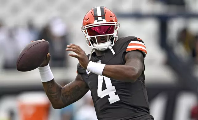 Cleveland Browns quarterback Deshaun Watson (4) warms up before an NFL football game against the Jacksonville Jaguars Sunday, Sept. 15, 2024, in Jacksonville, Fla. (AP Photo/Phelan M. Ebenhack)