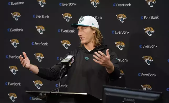 Jacksonville Jaguars quarterback Trevor Lawrence answers questions at a news conference after an NFL football game agains the Cleveland Browns, Sunday, Sept. 15, 2024, in Jacksonville, Fla. (AP Photo/John Raoux)