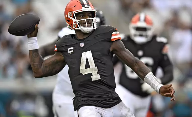 Cleveland Browns quarterback Deshaun Watson (4) looks for an open receiver during the second half of an NFL football game against the Jacksonville Jaguars Sunday, Sept. 15, 2024, in Jacksonville, Fla. (AP Photo/Phelan M. Ebenhack)