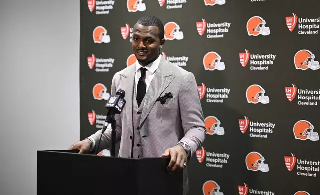 Cleveland Browns quarterback Deshaun Watson answers a question from a reporter during a news conference after an NFL football game against the Jacksonville Jaguars, Sunday, Sept. 15, 2024, in Jacksonville, Fla. (AP Photo/Phelan M. Ebenhack)