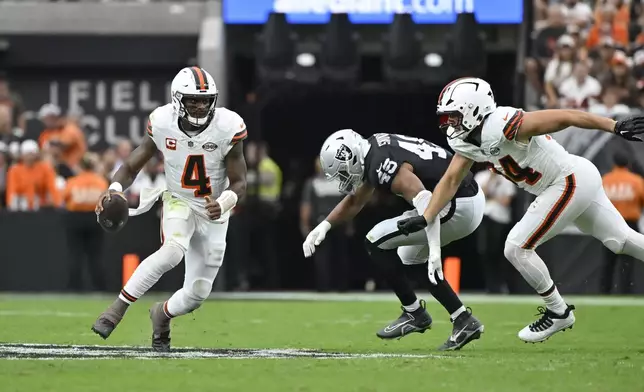 Cleveland Browns quarterback Deshaun Watson (4) scrambles during the first half of an NFL football game against the Las Vegas Raiders Sunday, Sept. 29, 2024, in Las Vegas. (AP Photo/David Becker)