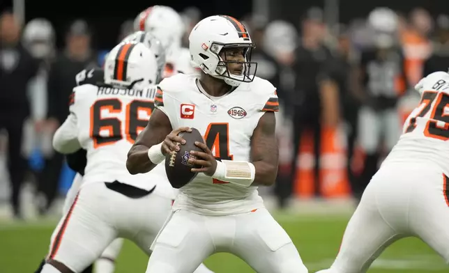 Cleveland Browns quarterback Deshaun Watson looks to pass during the first half of an NFL football game against the Las Vegas Raiders Sunday, Sept. 29, 2024, in Las Vegas. (AP Photo/John Locher)