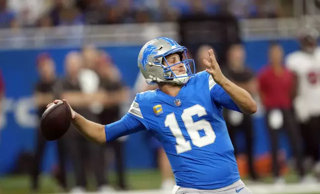 Detroit Lions quarterback Jared Goff throws during the first half of an NFL football game against the Tampa Bay Buccaneers, Sunday, Sept. 15, 2024, in Detroit. (AP Photo/Paul Sancya)