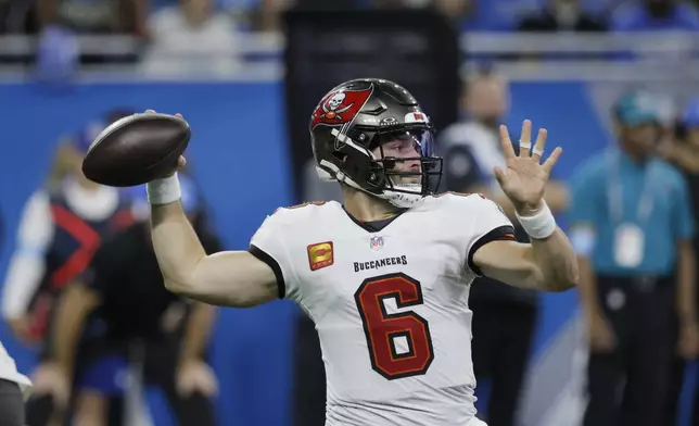 Tampa Bay Buccaneers quarterback Baker Mayfield throws during the first half of an NFL football game against the Detroit Lions, Sunday, Sept. 15, 2024, in Detroit. (AP Photo/Duane Burleson)