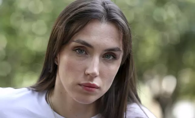 CORRECTS THE NAME OF SOURCE - Dziana Maiseyenka, 28, who fled Belarus a year ago to escape a crackdown on government opponents, poses for a picture in Yerevan, Armenia, Saturday, Sept. 7, 2024. (Hayk Baghdasaryan/Photolure via AP)