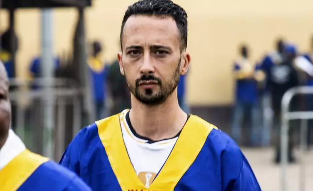 CORRECTS ID: American Benjamin Reuben Zalman-Polun arrives for a court verdict in Congo, Kinshasa, Friday Sept .13, 2024, on charges of taking part in a coup attempt in May 2024. (AP Photo/Samy Ntumba Shambuyi)