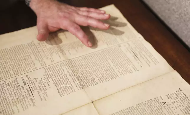 CORRECTS NAME TO BRUNK AUCTIONS - An 1787 copy of the U.S. Constitution that will be put up for auction on Sept. 28, 2024, is shown at Brunk Auctions in Asheville, North Carolina, on Thursday, Sept. 5. (AP Photo/Jeffrey Collins)