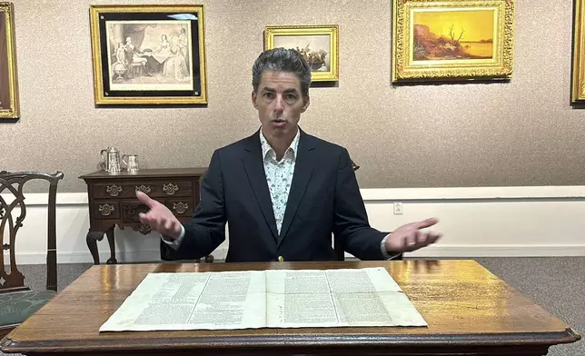 CORRECTS NAME TO BRUNK AUCTIONS -Auctioneer Andrew Brunk talks about a 1787 copy of the U.S. Constitution that will be put up for auction on Sept. 28, 2024 at Brunk Auctions in Asheville, N.C., on Thursday, Sept. 5. (AP Photo/Jeffrey Collins)