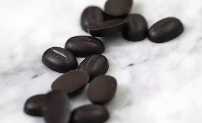 Chocolate callets are displayed at the California Cultured office in West Sacramento, Calif., Wednesday, Aug. 28, 2024. (AP Photo/Jeff Chiu)