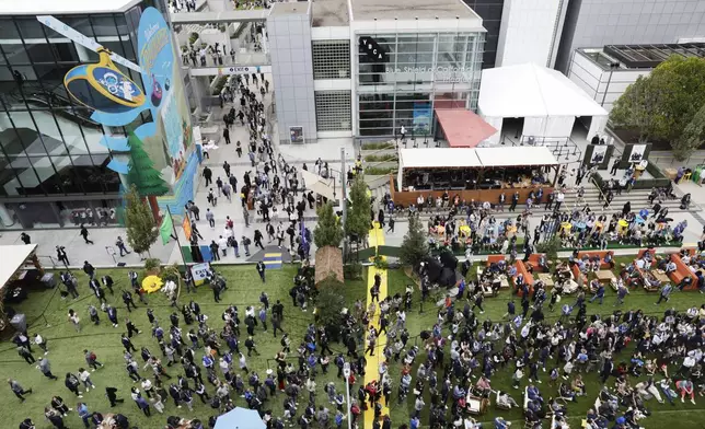 Thousands arrive for day one of the Dreamforce conference at Moscone Center in San Francisco, Tuesday, Sept. 17, 2024. (Brontë Wittpenn/San Francisco Chronicle via AP)