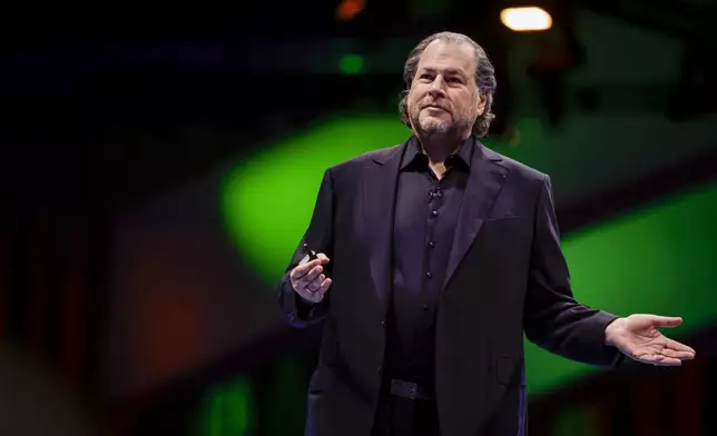 Salesforce CEO Marc Benioff speaks to thousands at the Moscone South Hall during Dreamforce in San Francisco, Tuesday, Sept. 17, 2024. (Brontë Wittpenn/San Francisco Chronicle via AP)