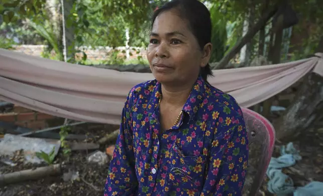 Norng La, a villager who lives along the Funan Techo Canal, is interviewed by The Associated Press at her home at Prek Takeo village eastern Phnom Penh Cambodia, Tuesday, July 30, 2024. (AP Photo/Heng Sinith)