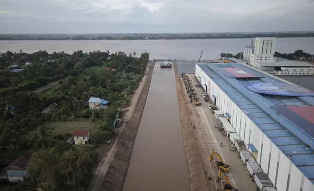 A view of the canal at Prek Takoe village eastern side of Phnom Penh, Cambodia, Tuesday, July 30, 2024. (AP Photo/Anton L. Delgado)