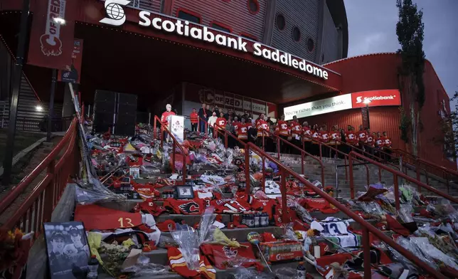 Former Calgary Flames player Lanny McDonald speaks at a vigil for former Calgary Flames player Johnny Gaudreau and his brother Matthew in Calgary, Alberta, Wednesday, Sept. 4, 2024. (Jeff McIntosh/The Canadian Press via AP)