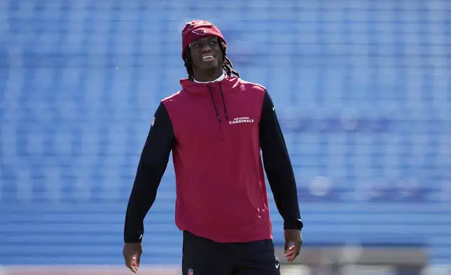 Arizona Cardinals' Marvin Harrison Jr. smiles before an NFL football game against the Buffalo Bills, Sunday, Sept. 8, 2024, in Orchard Park, N.Y. (AP Photo/Matt Slocum)