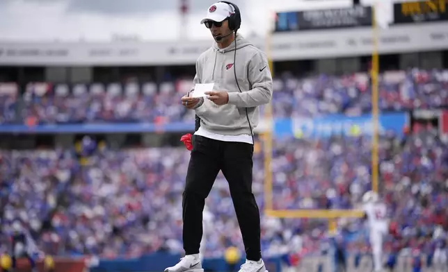 Arizona Cardinals head coach Jonathan Gannon walks along the sideline during the second half of an NFL football game against the Buffalo Bills Sunday, Sept. 8, 2024, in Orchard Park, N.Y. (AP Photo/Matt Slocum)