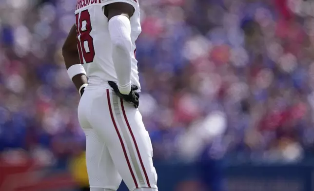 Arizona Cardinals' Marvin Harrison Jr. waits on the field during an NFL football game against the Buffalo Bills, Sunday, Sept. 8, 2024, in Orchard Park, N.Y. (AP Photo/Matt Slocum)