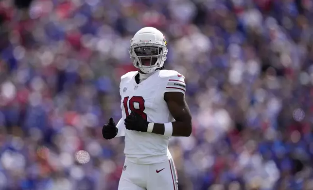 Arizona Cardinals' Marvin Harrison Jr. runs to the field during an NFL football game against the Buffalo Bills, Sunday, Sept. 8, 2024, in Orchard Park, N.Y. (AP Photo/Matt Slocum)