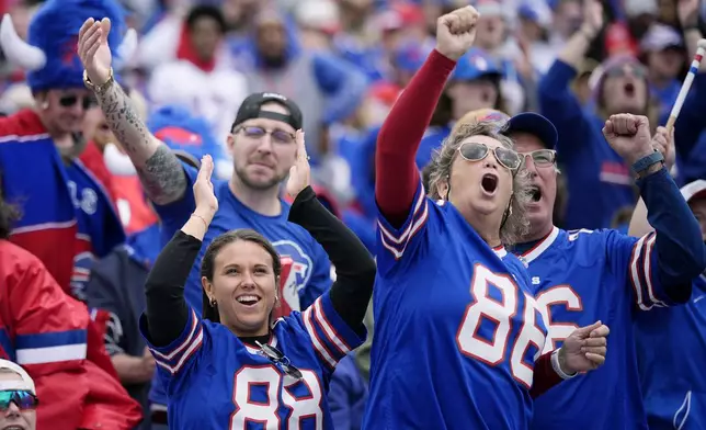 Buffalo Bills fans cheer on their team during the second half of an NFL football game against the Arizona Cardinals Sunday, Sept. 8, 2024, in Orchard Park, N.Y. (AP Photo/Matt Slocum)