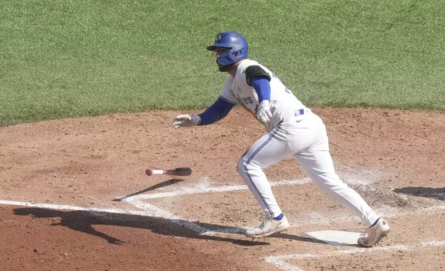 Toronto Blue Jays' Davis Schneider sets off to round the bases after hitting a two-run home run off St. Louis Cardinals pitcher Miles Mikolas during fifth-inning baseball game action in Toronto, Sunday Sept. 15, 2024. (Chris Young/The Canadian Press via AP)