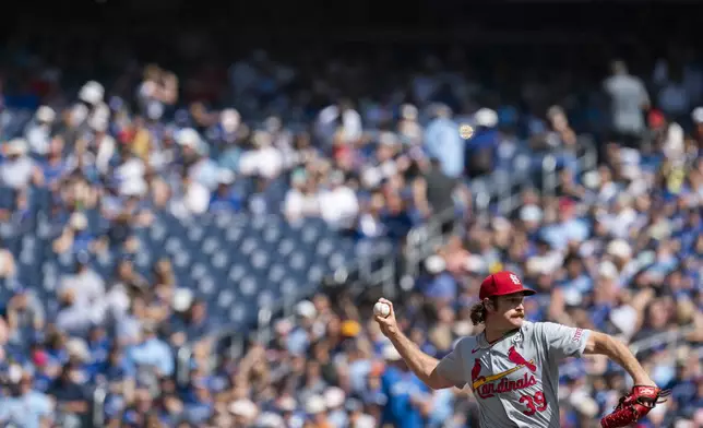 St. Louis Cardinals pitcher Miles Mikolas throws against the Toronto Blue Jays during first-inning baseball game action in Toronto, Sunday Sept. 15, 2024. (Paige Taylor White/The Canadian Press via AP)