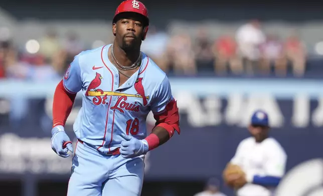 St. Louis Cardinals outfielder Jordan Walker (18) rounds the bases after hitting a home run off Toronto Blue Jays pitcher José Berrios during the third inning of a baseball game in Toronto, Saturday Sept. 14, 2024. (Chris Young/The Canadian Press via AP)