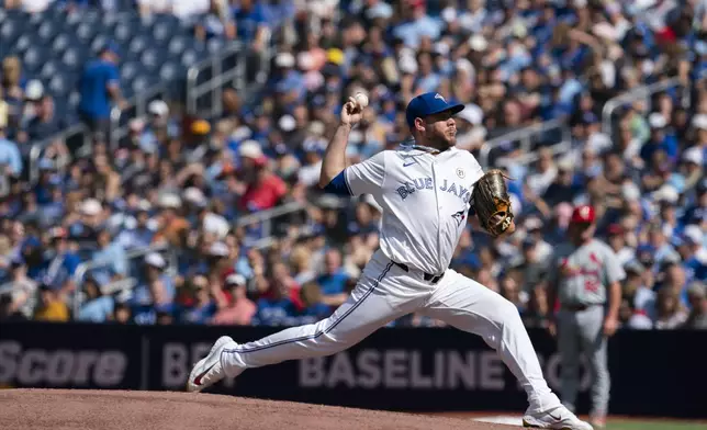 Toronto Blue Jays pitcher Yariel Rodríguez throws against the St. Louis Cardinals during first-inning baseball game action in Toronto, Sunday Sept. 15, 2024. (Paige Taylor White/The Canadian Press via AP)