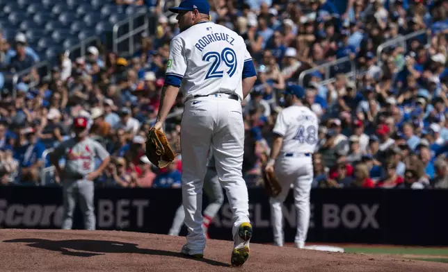 Toronto Blue Jays pitcher Yariel Rodríguez (29) goes to the mound during first-inning baseball game action against the St. Louis Cardinals in Toronto, Sunday Sept. 15, 2024. (Paige Taylor White/The Canadian Press via AP)