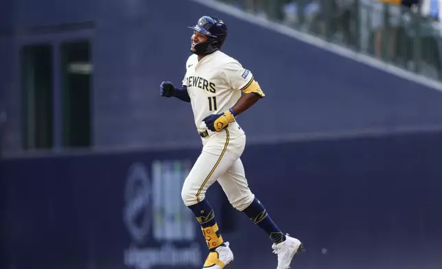 Milwaukee Brewers' Jackson Chourio rounds the bases during his grand slam home run against the St. Louis Cardinals during the sixth inning of a baseball game Monday, Sept. 2, 2024, in Milwaukee. (AP Photo/Jeffrey Phelps)