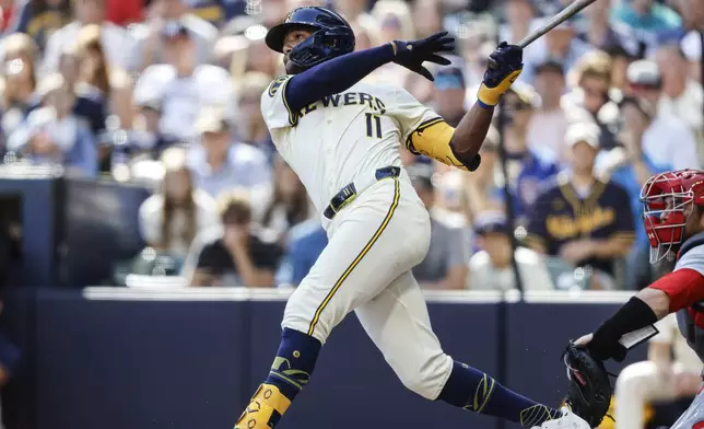 Milwaukee Brewers' Jackson Chourio hits a grand slam home run against the St. Louis Cardinals during the sixth inning of a baseball game Monday, Sept. 2, 2024, in Milwaukee. (AP Photo/Jeffrey Phelps)