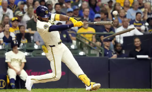 Milwaukee Brewers' Jackson Chourio hits a double during the fourth inning of a baseball game against the St. Louis Cardinals, Wednesday, Sept. 4, 2024, in Milwaukee. (AP Photo/Kayla Wolf)