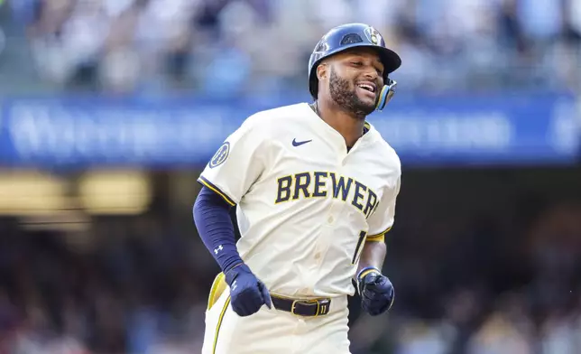 Milwaukee Brewers' Jackson Chourio rounds the bases during his grand slam home run against the St. Louis Cardinals during the sixth inning of a baseball game Monday, Sept. 2, 2024, in Milwaukee. (AP Photo/Jeffrey Phelps)