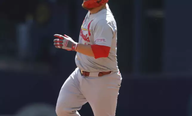 St. Louis Cardinals' Pedro Pagés (43) reacts as he rounds the bases after hitting a home run against the Milwaukee Brewers during the third inning of a baseball game, Monday, Sept. 2, 2024, in Milwaukee. (AP Photo/Jeffrey Phelps)