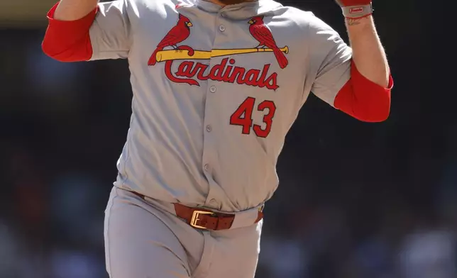 St. Louis Cardinals' Pedro Pagés (43) reacts as he rounds the bases after hitting a home run against the Milwaukee Brewers during the third inning of a baseball game, Monday, Sept. 2, 2024, in Milwaukee. (AP Photo/Jeffrey Phelps)