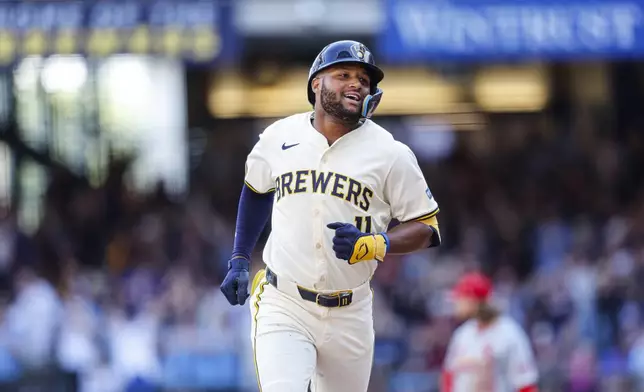 Milwaukee Brewers' Jackson Chourio rounds the bases during his grand slam home run against the St. Louis Cardinals during the sixth inning of a baseball game Monday, Sept. 2, 2024, in Milwaukee. (AP Photo/Jeffrey Phelps)