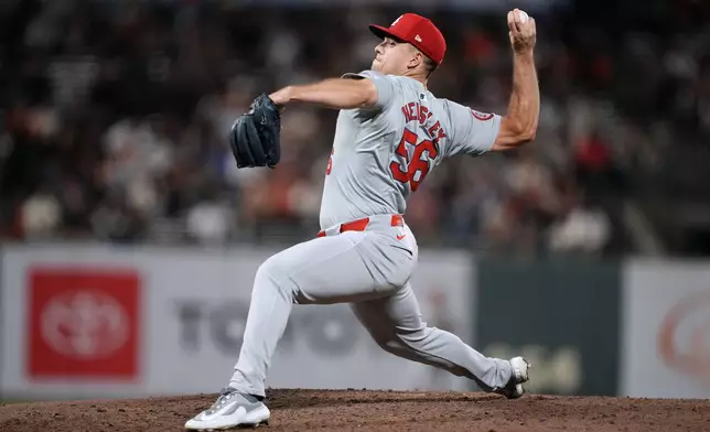 St. Louis Cardinals pitcher Ryan Helsley (56) throws against the San Francisco Giants during the ninth inning of a baseball game Friday, Sept. 27, 2024, in San Francisco. (AP Photo/Tony Avelar)