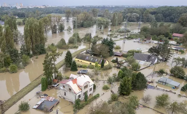 An aerial view of a flooded neighborhood in Ostrava, Czech Republic, Monday, Sept. 16, 2024. (AP Photo/Darko Bandic)