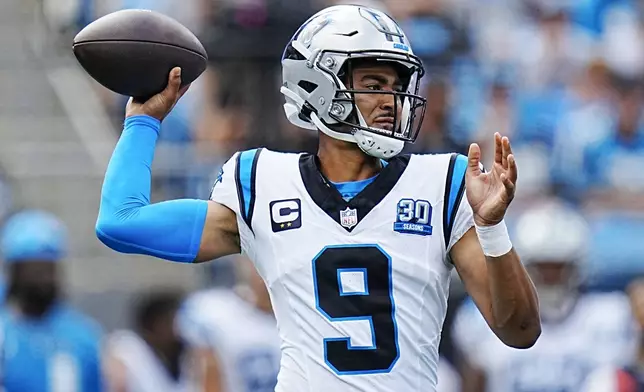 Carolina Panthers quarterback Bryce Young passes against the Los Angeles Chargers during the first half of an NFL football game on Sunday, Sept. 15, 2024, in Charlotte, N.C. (AP Photo/Rusty Jones)