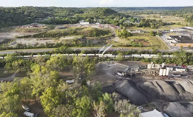 Firefighters work on the scene of a chemical leak in railcars near Cleves, Ohio, Tuesday, Sept. 24, 2024. (Local 12/WKRC via AP)