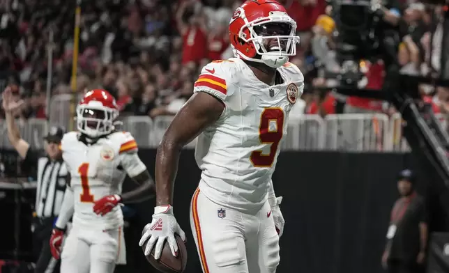 Kansas City Chiefs wide receiver JuJu Smith-Schuster (9) celebrates his touchdown against the Atlanta Falcons during the second half of an NFL football game, Sunday, Sept. 22, 2024, in Atlanta. (AP Photo/Brynn Anderson)