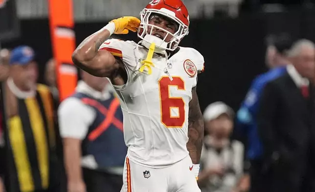 Kansas City Chiefs safety Bryan Cook (6) reacts after the Kansas City Chiefs stopped the Atlanta Falcons on fourth down late in the game during the second half of an NFL football game, Sunday, Sept. 22, 2024, in Atlanta. The Kansas City Chiefs 22-17. (AP Photo/John Bazemore)