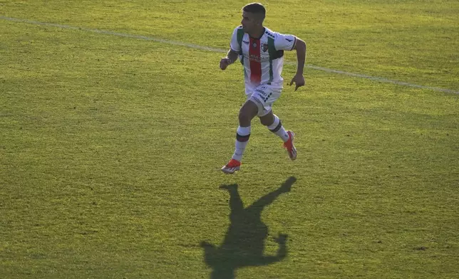 Club Palestino's Nicolas Linares plays in a local league soccer match against Santiago Wanderers at La Cisterna stadium in Santiago, Chile, Friday, July 12, 2024. (AP Photo/Matias Basualdo)