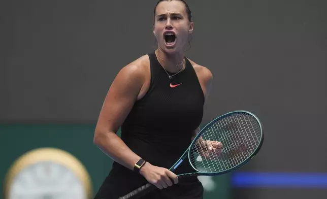 Aryna Sabalenka of Belarus reacts during a match against Mananchaya Sawangkaew of Thailand for the China Open tennis tournament held at the National Tennis Center in Beijing, Saturday, Sept. 28, 2024. (AP Photo/Ng Han Guan)