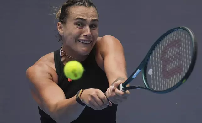 Aryna Sabalenka of Belarus returns a shot to Mananchaya Sawangkaew of Thailand during the China Open tennis tournament held at the National Tennis Center in Beijing, Saturday, Sept. 28, 2024. (AP Photo/Ng Han Guan)