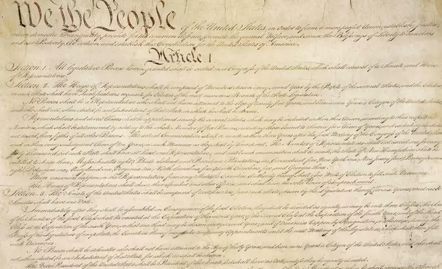 FILE - This photo made available by the U.S. National Archives shows a portion of the first page of the United States Constitution. (National Archives via AP, File)