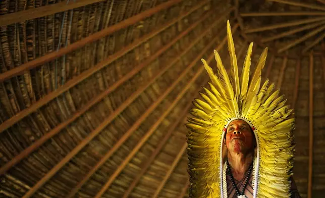 Apolima-Arara leader Jose Angelo Macedo Avelino sings in Nordestino village, Acre state, Brazil, Monday, June 24, 2024. (AP Photo/Jorge Saenz)