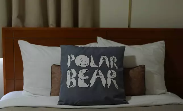 A pillow sits on a bed, Friday, Aug. 2, 2024, at the Polar Inn and Suites in Churchill, Manitoba. (AP Photo/Joshua A. Bickel)