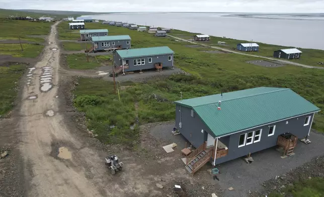 Homes of people who relocated from Newtok, Alaska are visible in Mertarvik, Alaska on Tuesday, Aug. 13, 2024. (AP Photo/Rick Bowmer)